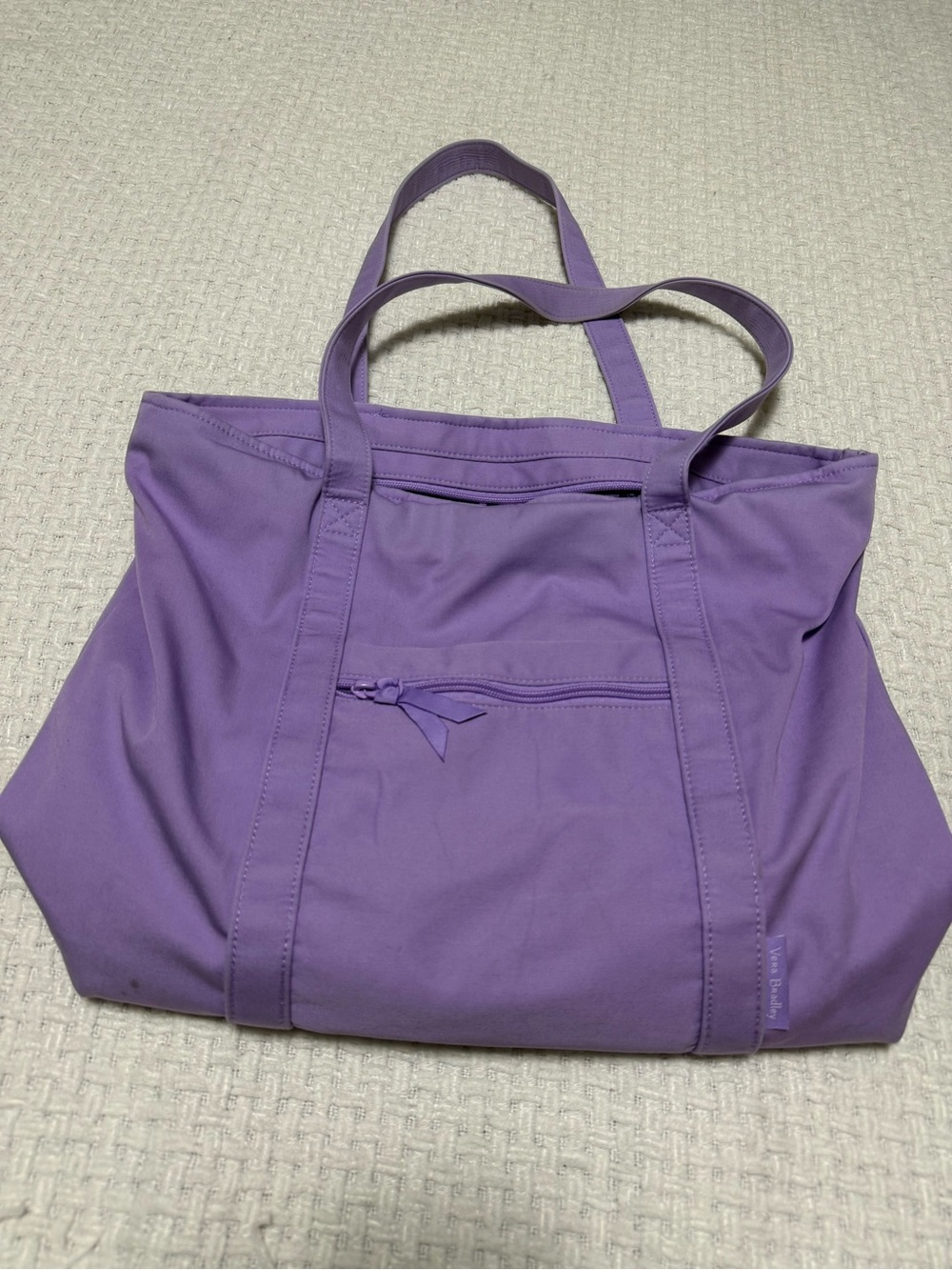 Vera Bradley Canvas Vera Tote, purple with floral lining.  See photos for wear.